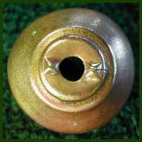 Machine stamped bell with rivet base