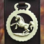Display strap with 7 horse brasses