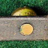 Back of bell with rivet fastener