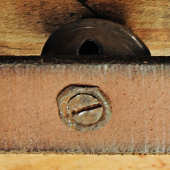 Back of bell with old screw fastener